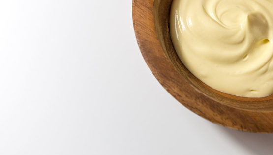 Close up of whipped butter in wooden bowl