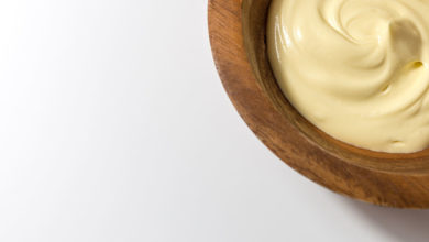 Close up of whipped butter in wooden bowl